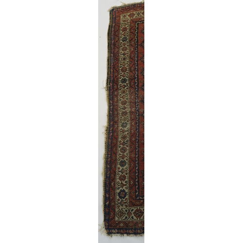 97 - A BLUE GROUND CAUCASIAN RUG