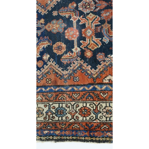 97 - A BLUE GROUND CAUCASIAN RUG