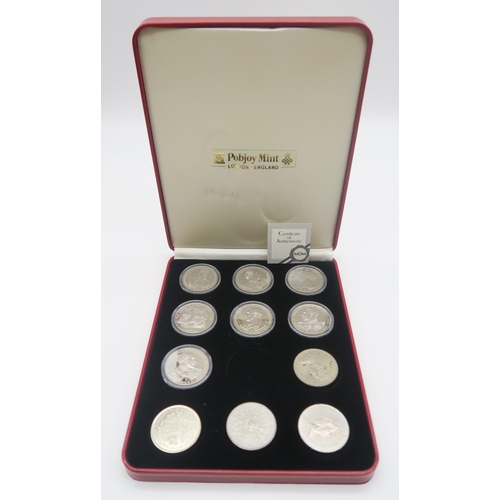 543 - A lot British and American commemorative coins with cased examples together with various bank notes ... 