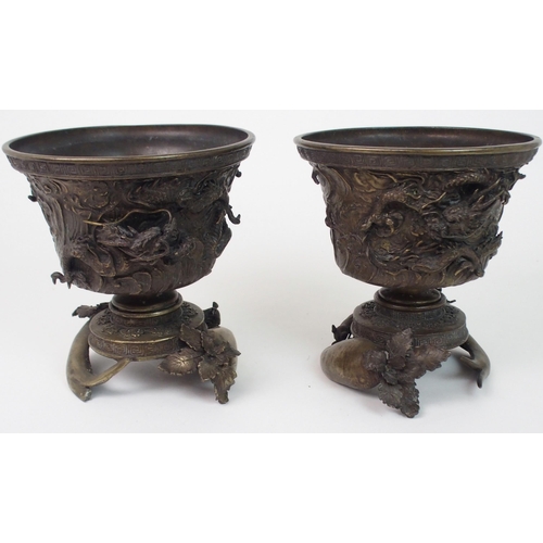 173 - A PAIR OF CHINESE BRONZE JARDINIERES ON STANDS