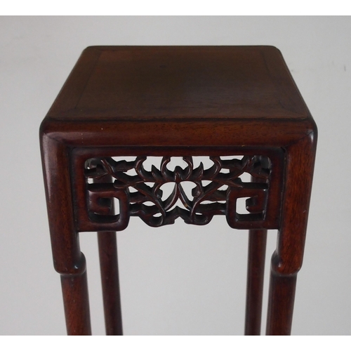 185 - A CHINESE HARDWOOD VASE STAND