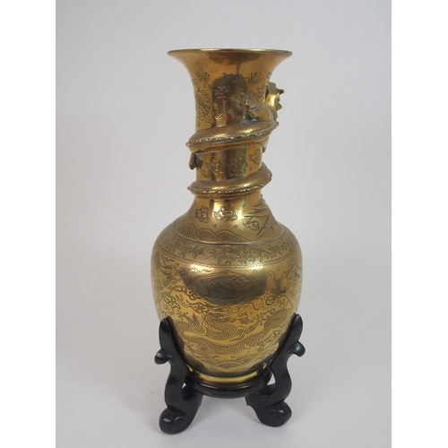 200 - A CHINESE BRASS BALUSTER VASE