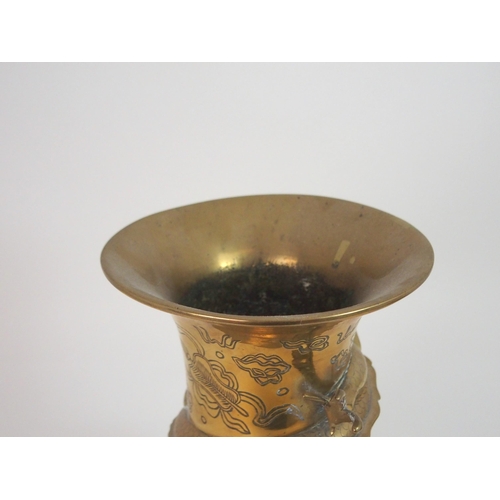 200 - A CHINESE BRASS BALUSTER VASE