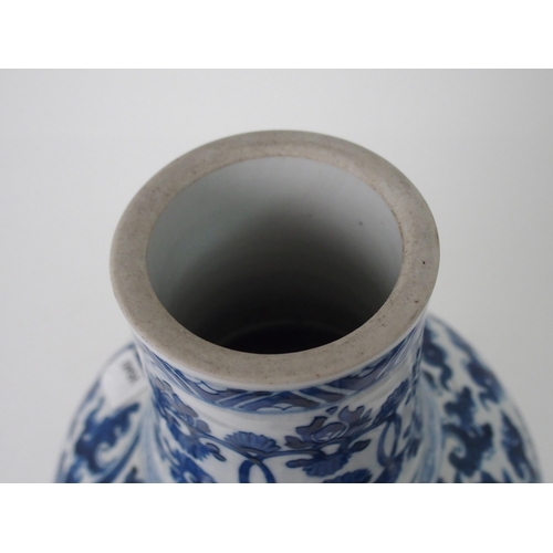 212 - A CHINESE BLUE AND WHITE BALUSTER VASE