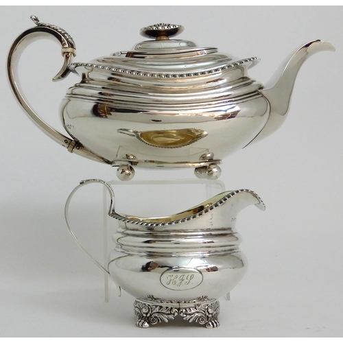 244 - A GEORGE IV SILVER TEAPOT