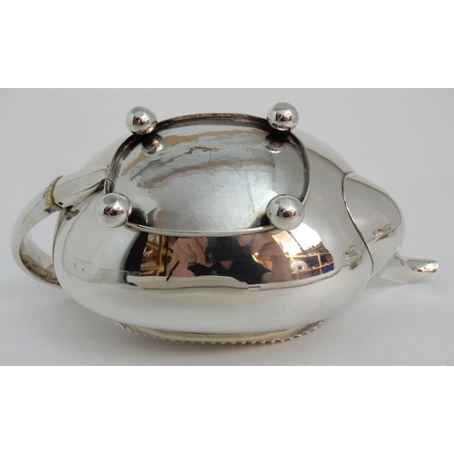 244 - A GEORGE IV SILVER TEAPOT