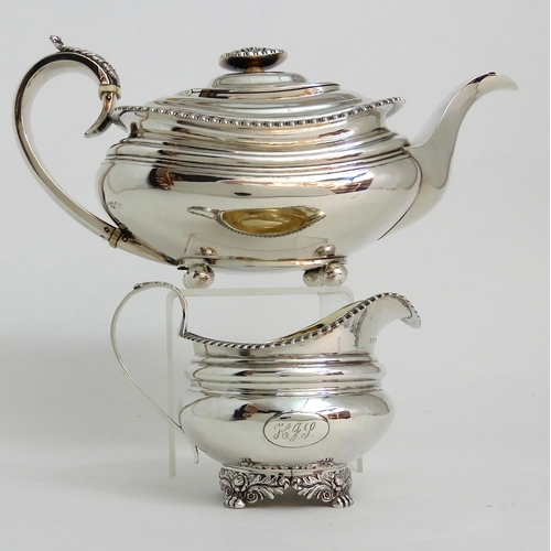 244 - A GEORGE IV SILVER TEAPOT