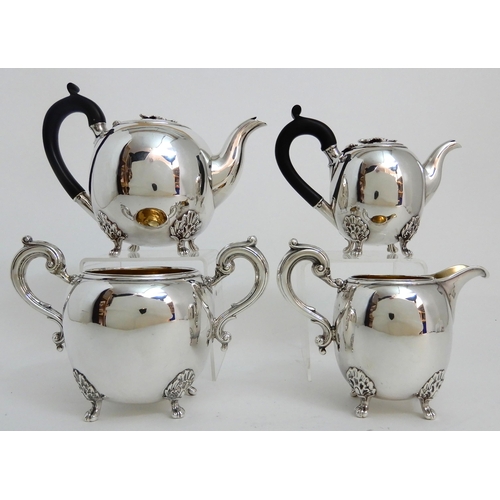 245 - A FOUR PIECE SILVER TEA SERVICE