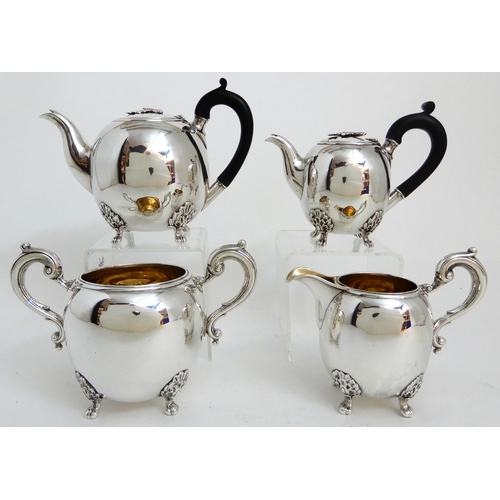 245 - A FOUR PIECE SILVER TEA SERVICE