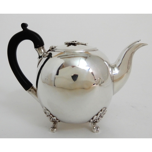 245 - A FOUR PIECE SILVER TEA SERVICE