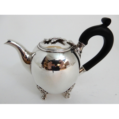 245 - A FOUR PIECE SILVER TEA SERVICE