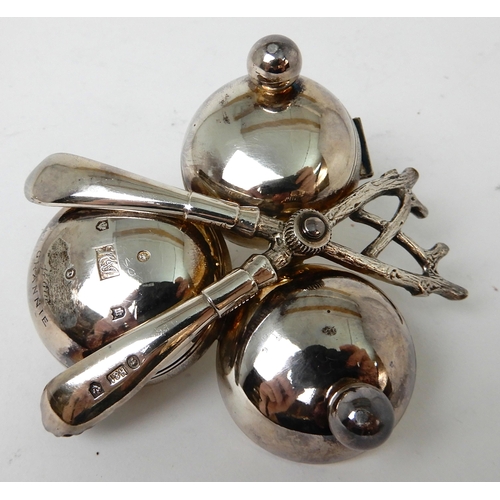 249 - A NOVELTY THREE PIECE SILVER CONDIMENT SET