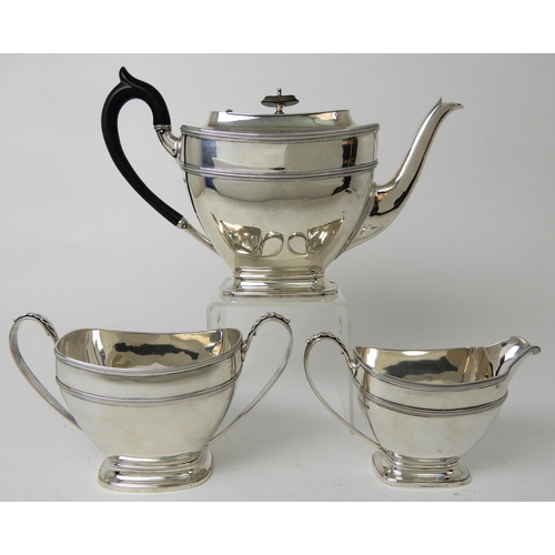 253 - A THREE PIECE SILVER TEA SERVICE