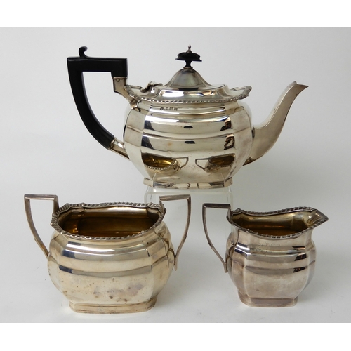 256 - A THREE PIECE SILVER TEA SERVICE