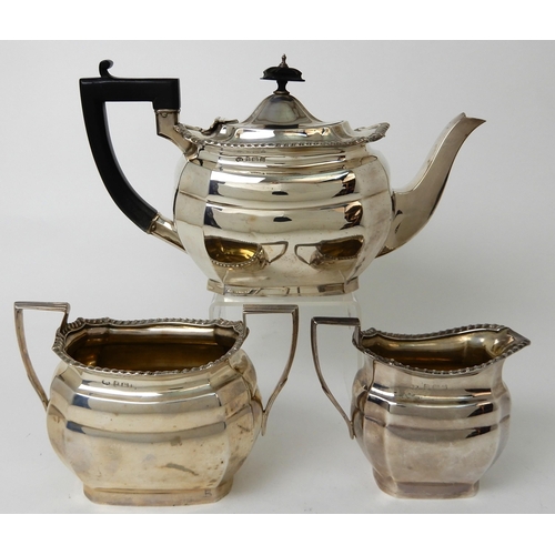 256 - A THREE PIECE SILVER TEA SERVICE