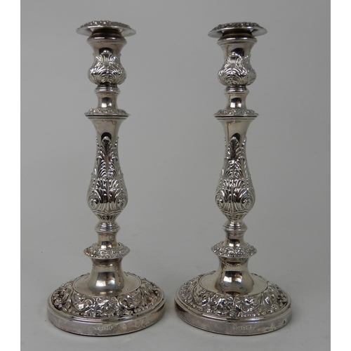 266 - A PAIR OF SILVER CANDLESTICKS