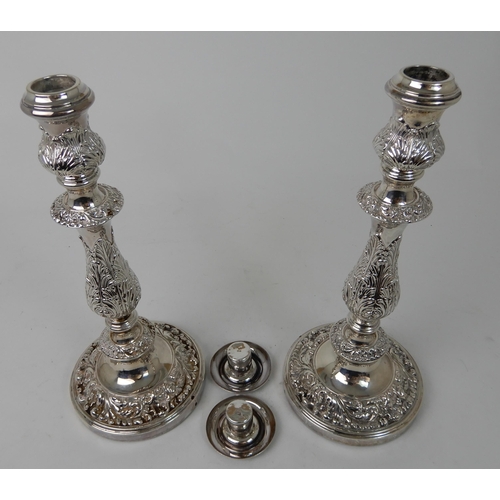 266 - A PAIR OF SILVER CANDLESTICKS