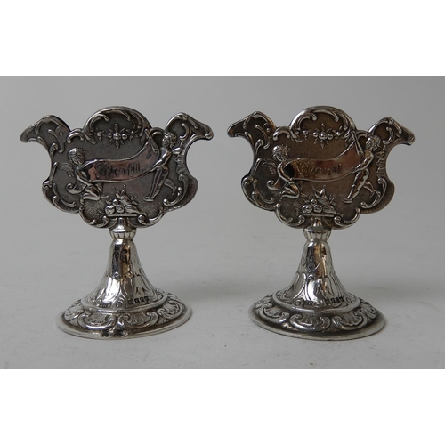 271 - A PAIR OF SILVER MENU HOLDERS