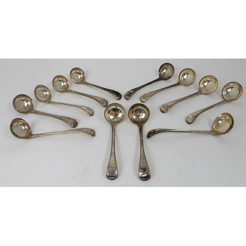 293 - A SET OF TWELVE SILVER SAUCE LADLES