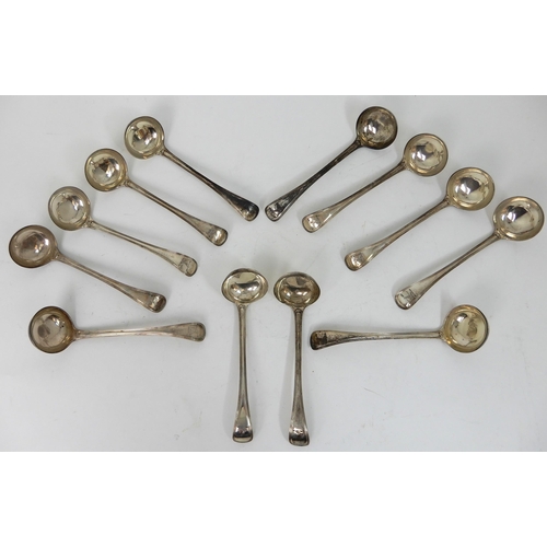 293 - A SET OF TWELVE SILVER SAUCE LADLES