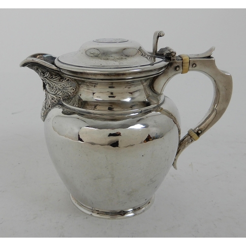 303 - AN EDWARDIAN SILVER LIDDED ALE JUG