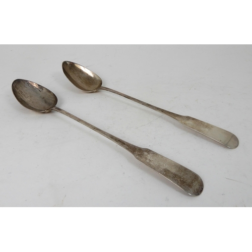 305 - A PAIR OF SILVER BASTING SPOONS