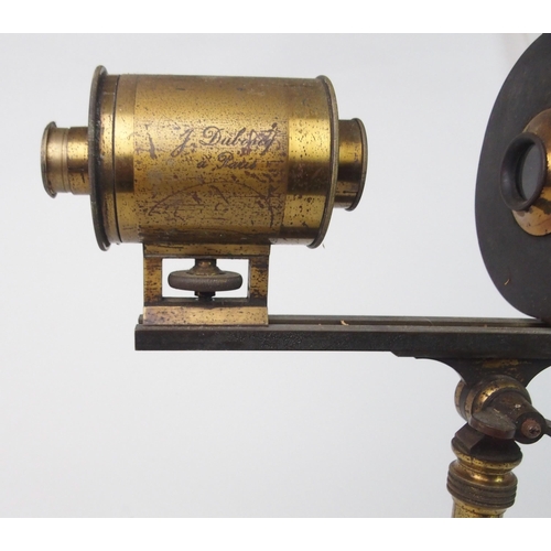 371 - A VINTAGE FRENCH BRASS PROJECTING MICROSCOPE