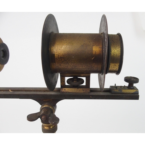 371 - A VINTAGE FRENCH BRASS PROJECTING MICROSCOPE