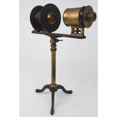 371 - A VINTAGE FRENCH BRASS PROJECTING MICROSCOPE