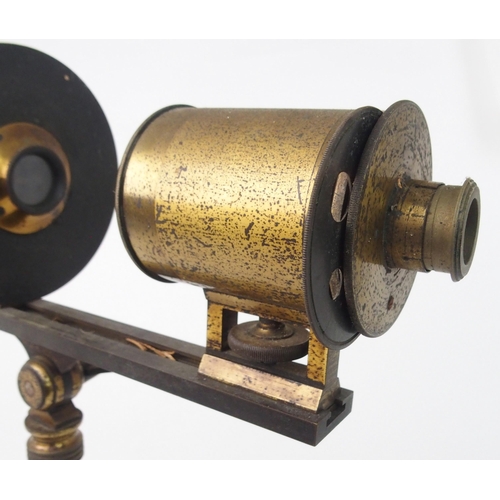 371 - A VINTAGE FRENCH BRASS PROJECTING MICROSCOPE