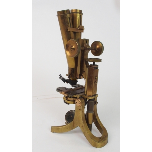 372 - A VICTORIAN BRASS MICROSCOPE BY J SWIFT AND SON