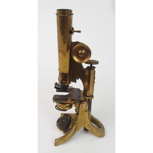 372 - A VICTORIAN BRASS MICROSCOPE BY J SWIFT AND SON