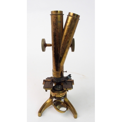 372 - A VICTORIAN BRASS MICROSCOPE BY J SWIFT AND SON