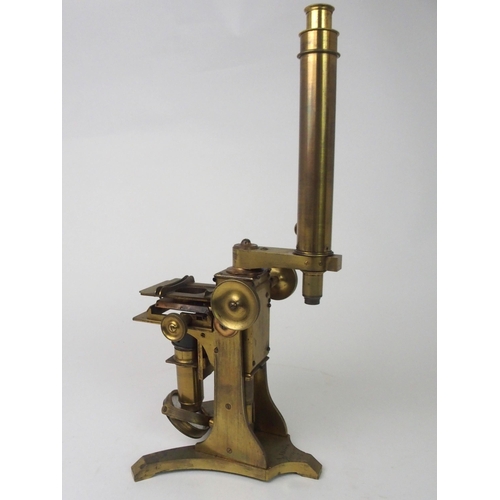 377 - A VICTORIAN BRASS MICROSCOPE BY A. ROSS  LONDON