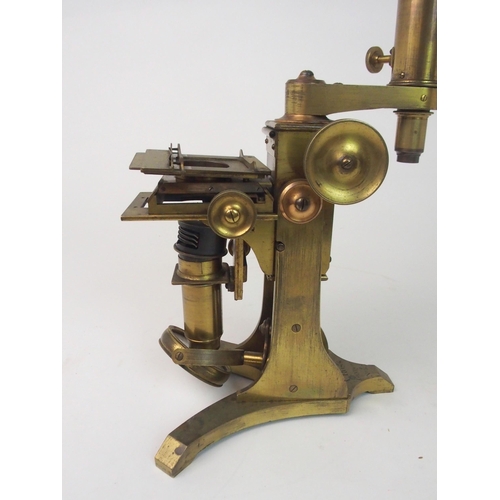 377 - A VICTORIAN BRASS MICROSCOPE BY A. ROSS  LONDON