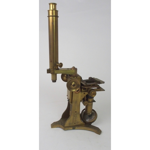 377 - A VICTORIAN BRASS MICROSCOPE BY A. ROSS  LONDON