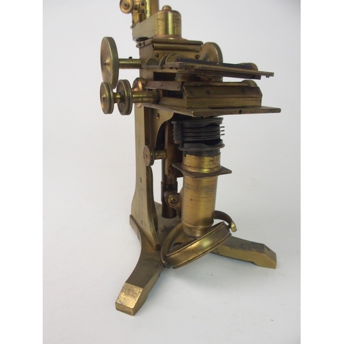 377 - A VICTORIAN BRASS MICROSCOPE BY A. ROSS  LONDON