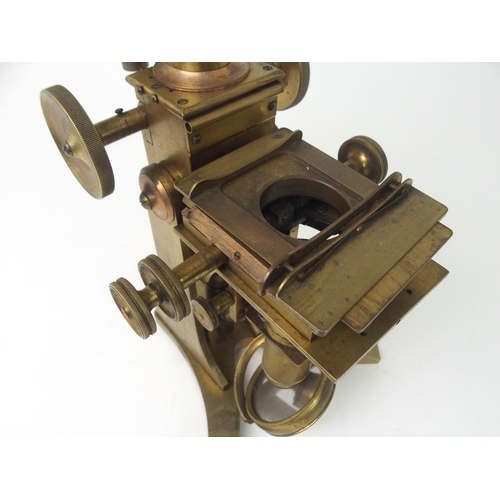 377 - A VICTORIAN BRASS MICROSCOPE BY A. ROSS  LONDON