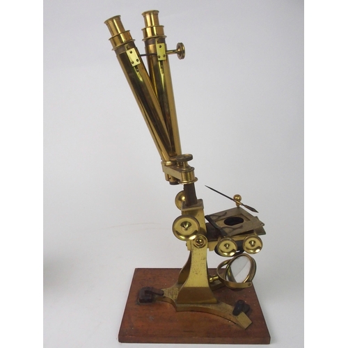 379 - A VICTORIAN BRASS MICROSCOPE