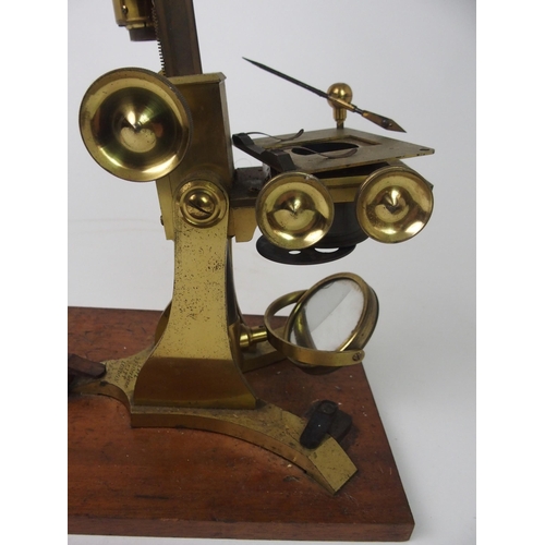 379 - A VICTORIAN BRASS MICROSCOPE