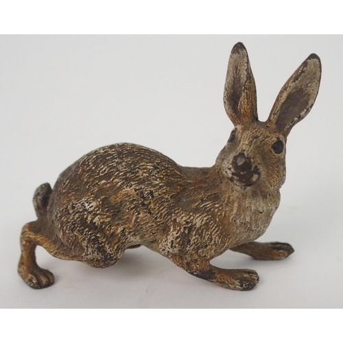 393 - A COLD-PAINTED BRONZE FIGURE OF A HARE