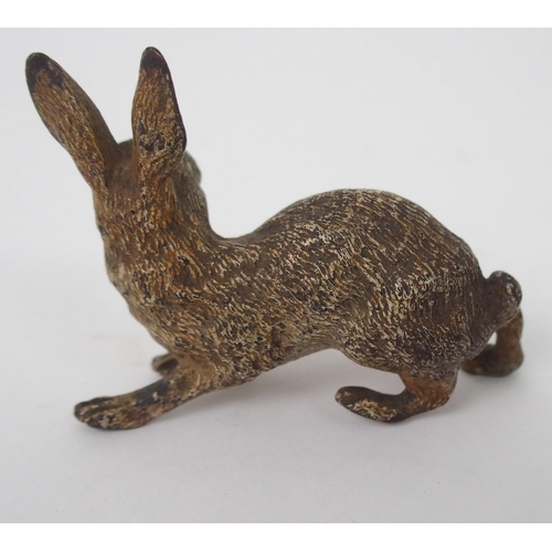 393 - A COLD-PAINTED BRONZE FIGURE OF A HARE