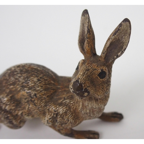 393 - A COLD-PAINTED BRONZE FIGURE OF A HARE