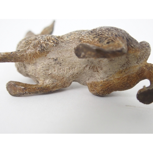 393 - A COLD-PAINTED BRONZE FIGURE OF A HARE