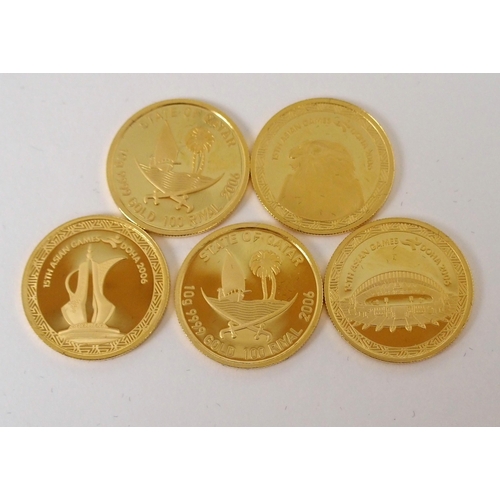 410 - A CASED SET OF FIVE DOHA 2006 15TH ASIAN GAMES GOLD COINS