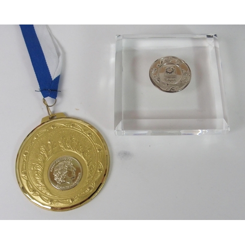 421 - A CASED SET OF 2004 OLYMPIC SPECIAL ISSUE BRONZE MEDALLIONS