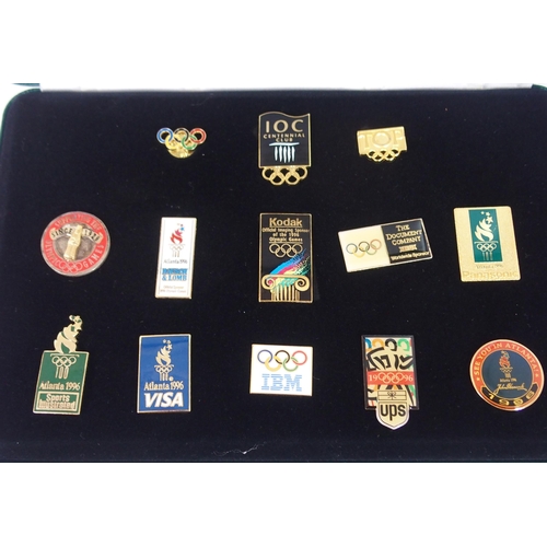 425 - TWO CASED SET OF THE OLYMPIC PROGRAMME ATLANTA 1996 ENAMEL LAPEL BADGES