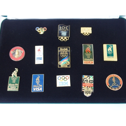 425 - TWO CASED SET OF THE OLYMPIC PROGRAMME ATLANTA 1996 ENAMEL LAPEL BADGES