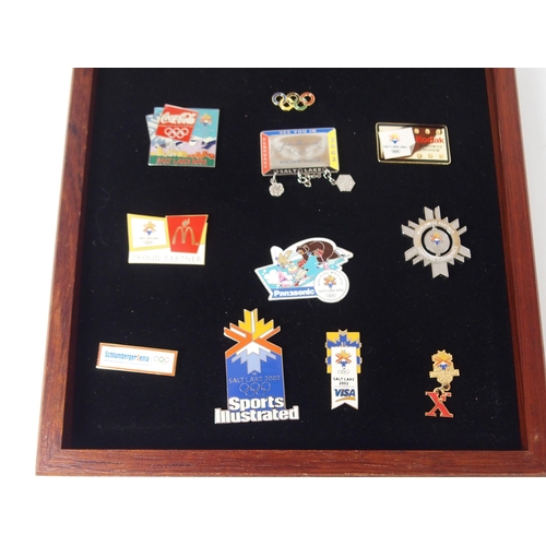 425 - TWO CASED SET OF THE OLYMPIC PROGRAMME ATLANTA 1996 ENAMEL LAPEL BADGES