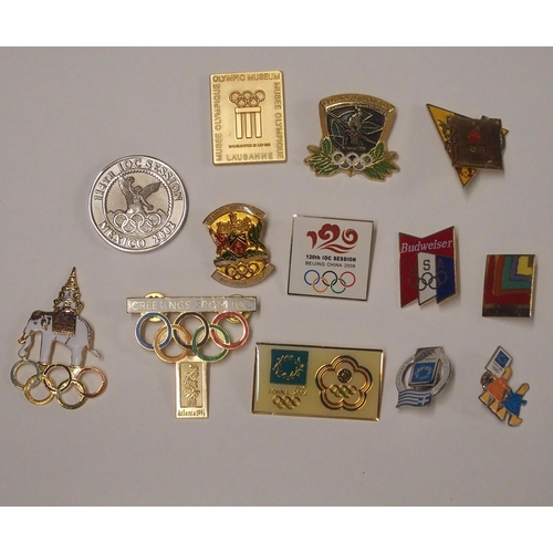 426 - A LARGE COLLECTION OF OLYMPIC ENAMEL LAPEL BADGES